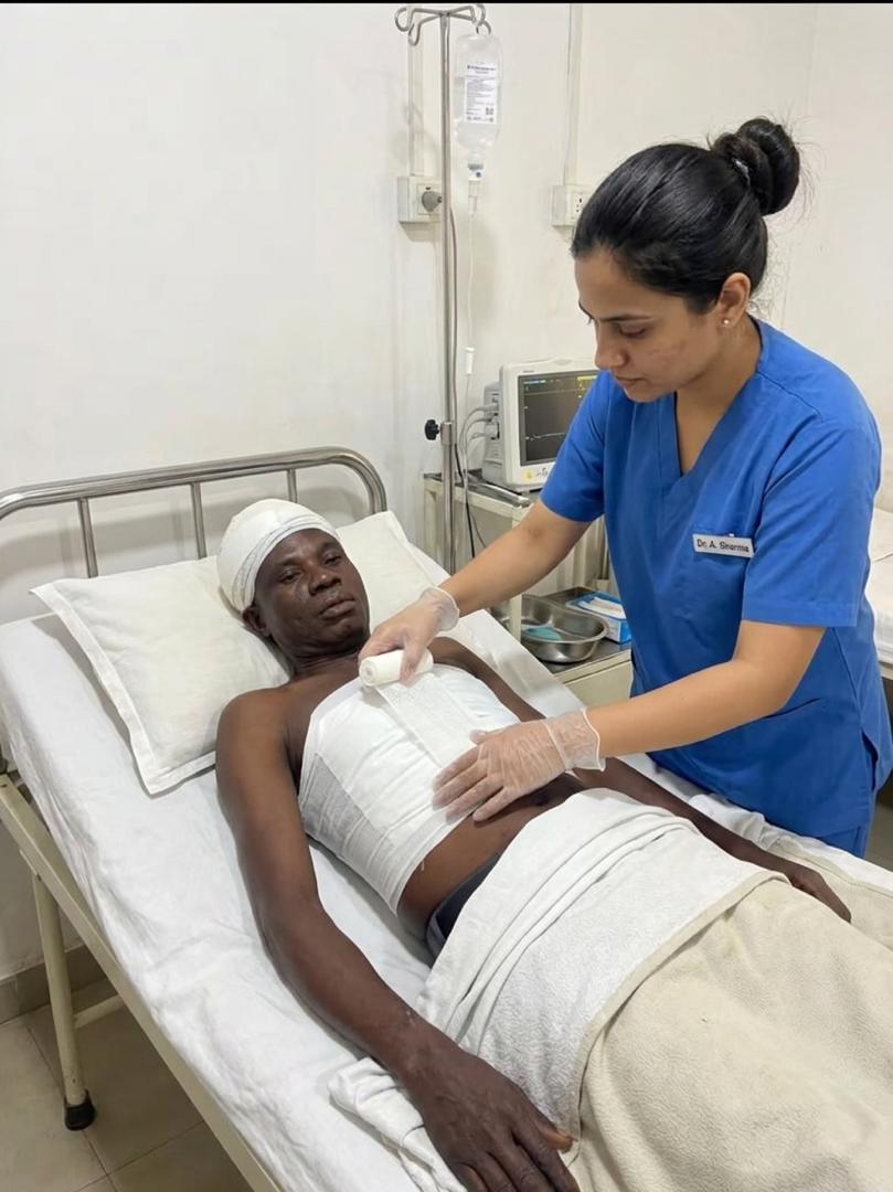 A practitioner applying an external dressing during supportive care